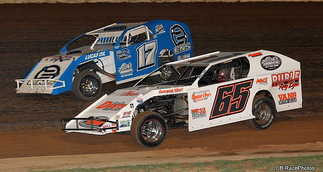 Kris Jackson (65) battles with Mike Striegel (17) in USRA B-Mod action.