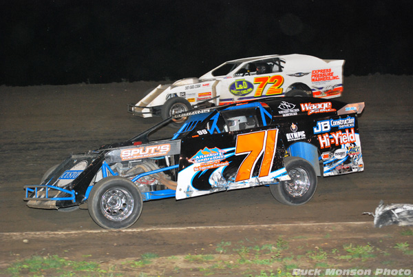Jason Cummins (71) works to the inside of Doug Hillson (72) en route to winning the Guttormson Memorial at the Chateau Raceway in Lansing, Minn., on Friday, June 4, 2010. (Buck Monso Photo)