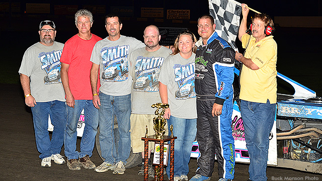 Brad Smith celebrates with family and crew after winning the USRA B-Mod main event on Thursday, Oct. 3, at the Lakeside Speedway in Kansas City, Kan.