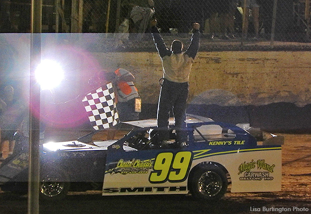 Brad Smith celebrates his USRA B-Mod feature win on Saturday, July 6, at the Valley Speedway.