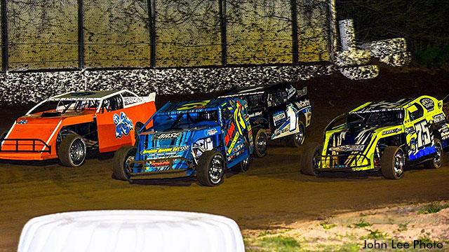 Kevin Blackburn (26), Shad Badder (73b), Tim Karrick (1k) and eventual winner Gunner Martin (75) had an intense battle for the $1,000-to-win payday in the USRA Modified feature last Saturday at the Central Missouri Speedway.