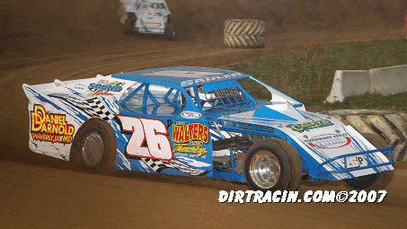 Kevin Pittman of Waterloo captured the opening night checkers in the USRA Modified class.