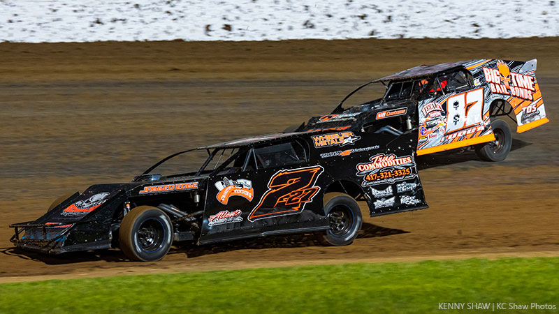Chase Domer (227) is the current USRA Modified points leader at the Lucas Oil Speedway. Here he battles with defending track and Summit USRA Weekly Racing Series national champ Darron Fuqua.