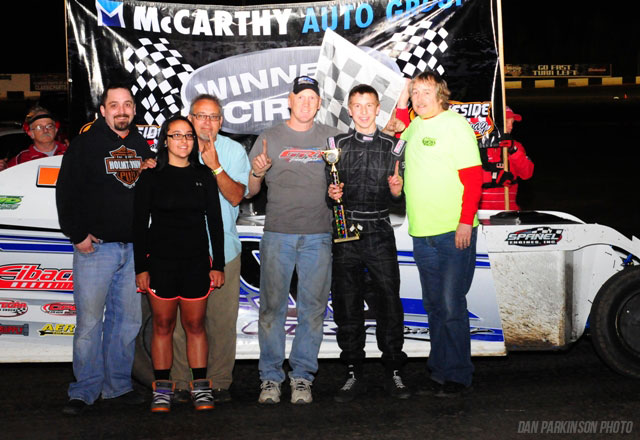 Trevor Hunt is joined by his family and crew after winning his first USRA Modified feature at the Lakeside Speedway in Kansas City, Kan., on Friday, May 2.