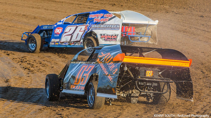 Kevin Blackburn (26) leads John Allen (03) around the Central Missouri Speedway. Blackburn claimed his third USRA Modified feature of the year last week.