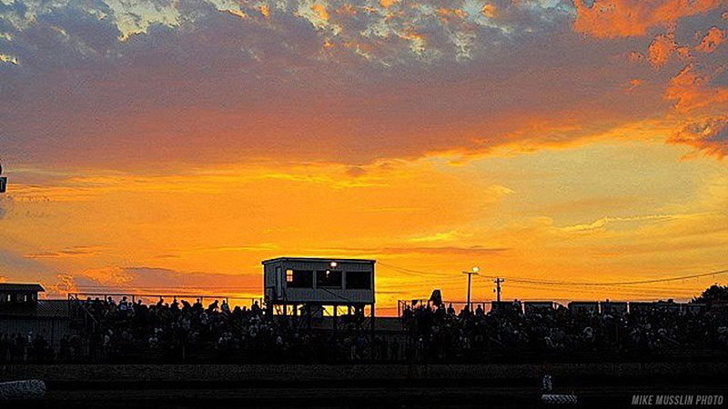 The sun sets over a night of racing at Central Missouri Speedway.