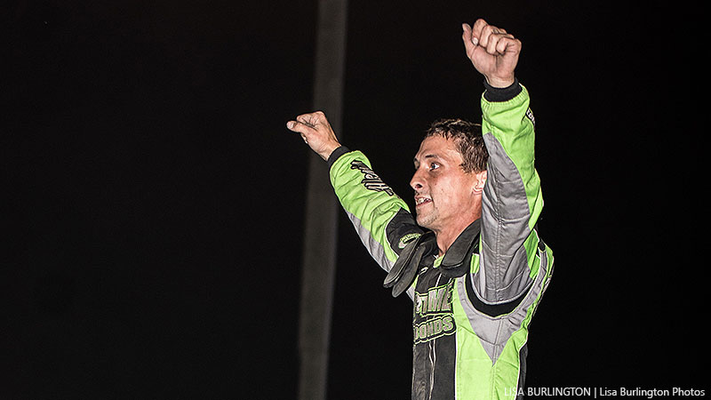 Brett Heeter celebrates after winning the USRA Stock Car feature.