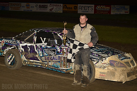 Jake Masters celebrates in victory lane after scoring his fifth career Iron Man victory and a $700 payday.