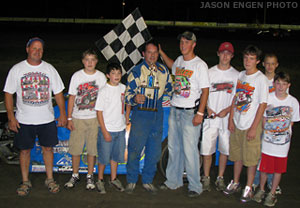 Jeff Schluetter of New Hampton celebrates with family and crew after winning the USRA Modified feature.