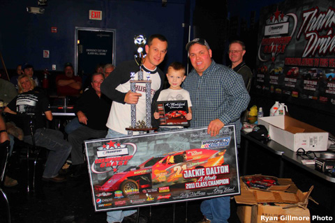 Jackie Dalton took home his fifth USRA RHS Modified track championship and accepted his points fund check and jacket along with his son, Jett.