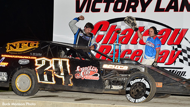 Brad Waits celebrates in victory lane after his USRA Modified feature win on Friday, June 21, at the Chateau Raceway in Lansing, Minn.
